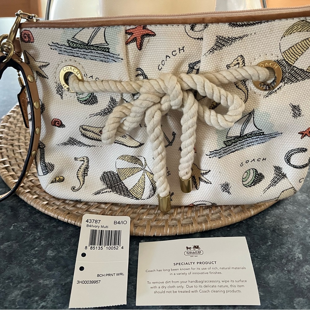 Coach Cream Clutch with Nautical Accents